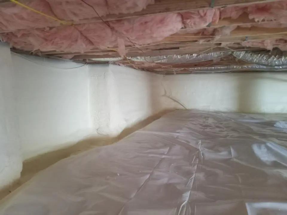 Crawl space encapsulation with closed-cell spray foam for Commercial Roof Restoration in Van Buren